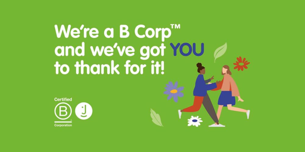 Stylised image of two people meeting outside and about to hug. Text reads we're a b corp and we've got you to thank for it.